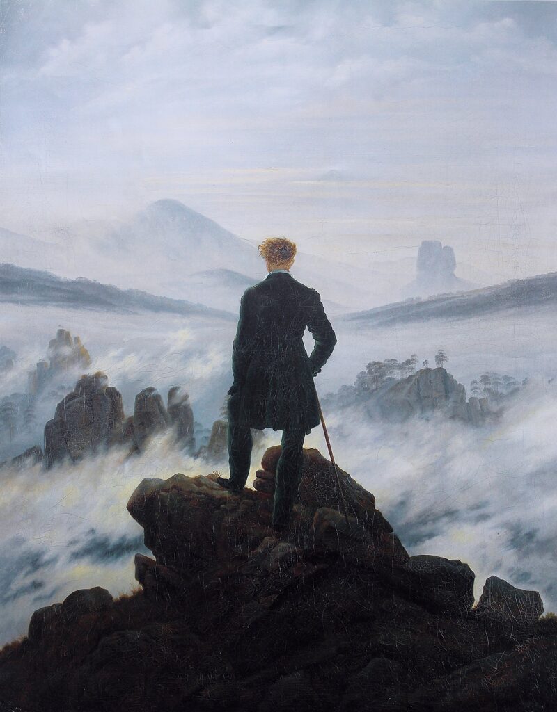 Wanderer Above the Sea of Fog by Caspar David Friedrich — a man in a coat stands on a rocky peak above clouds